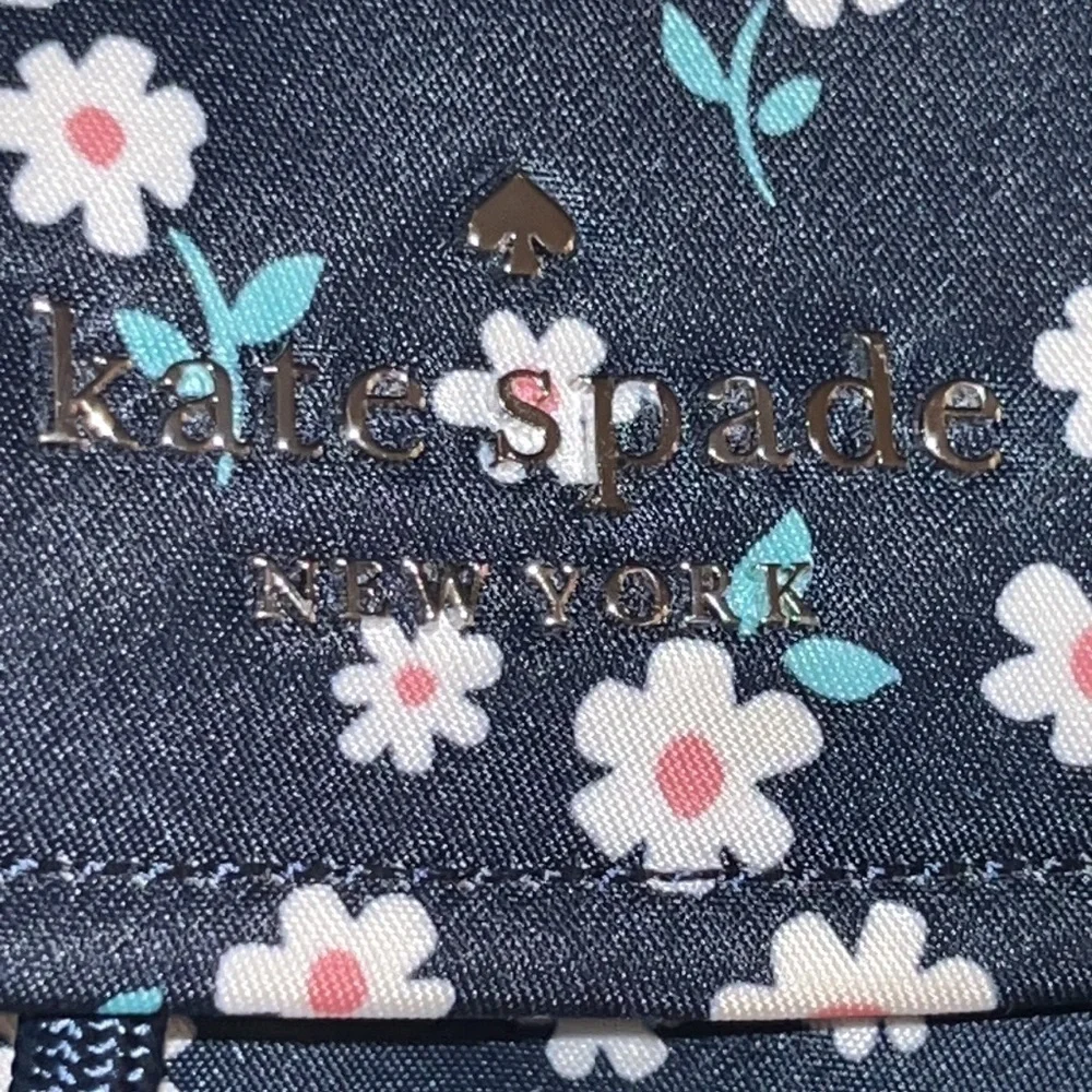 kate spade New York Carley flap backpack WKR00432